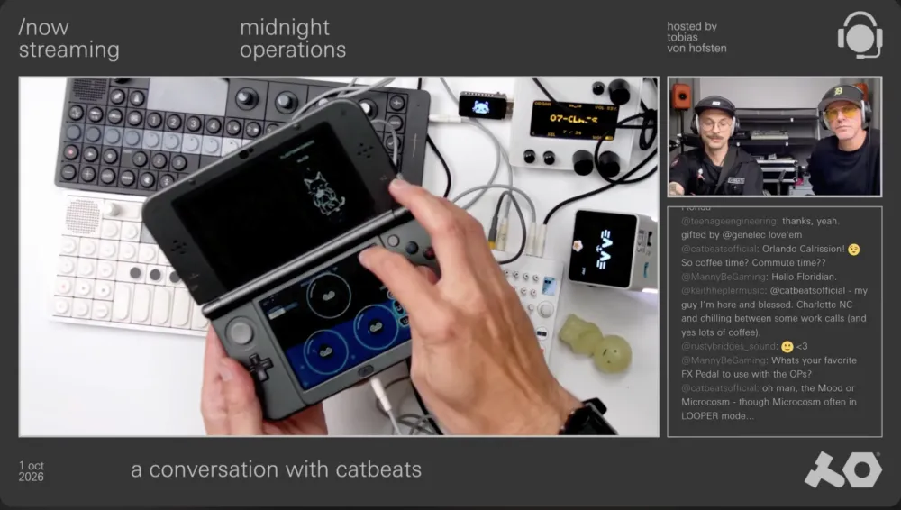Midnight Operations livestream: catbeats holding a Nintendo 3DS running Ocarina 3DS, surrounded by hardware synths.